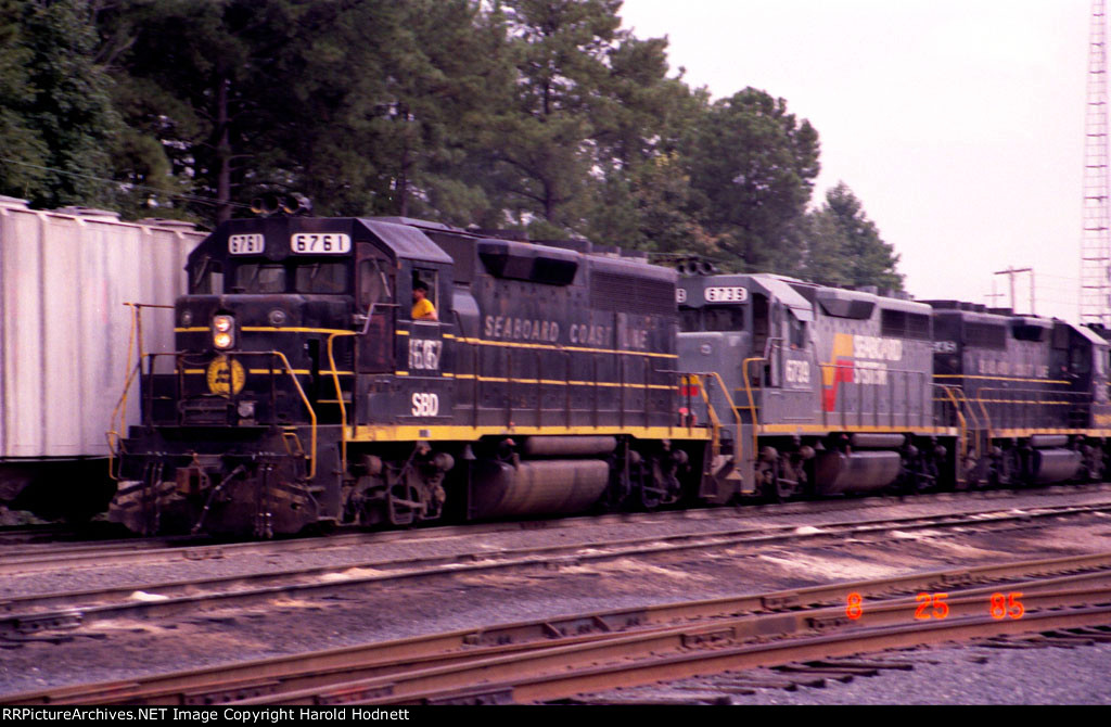 SBD 6761 leads a string of SBD locos thru the NS yard